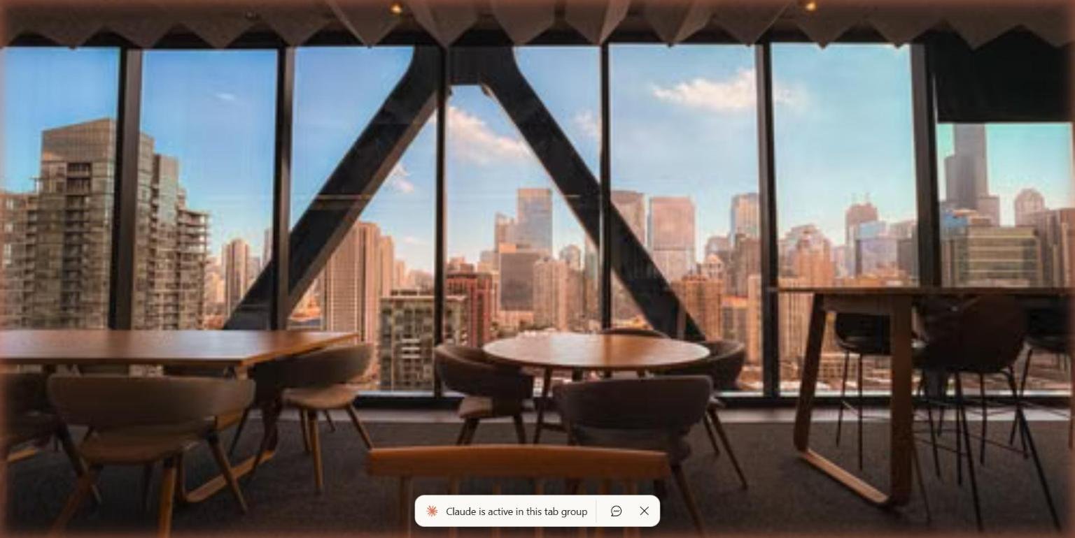 Executive office overlooking the city skyline, reviewing workforce dashboards